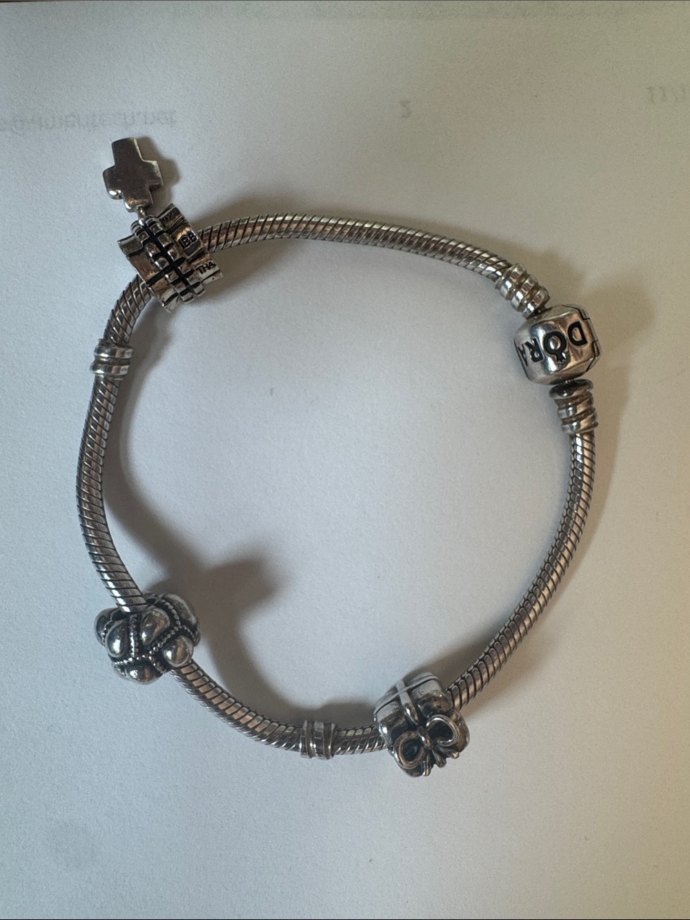 Pandora Sterling Silver Snake Chain Bracelet with 3 Charms. 7.5 inches